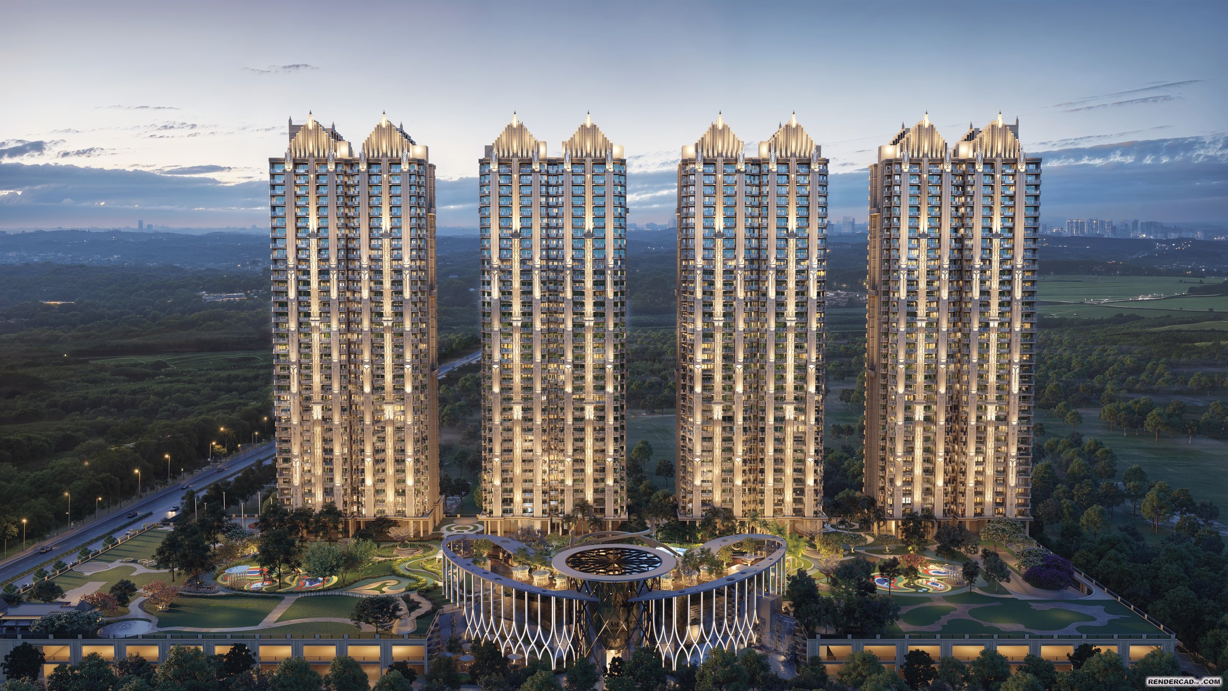 Gaur Alaris towers illuminated at dusk